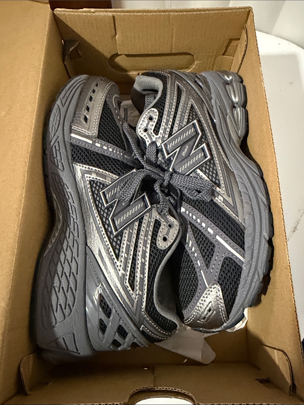 New Balance Kids Gray and Black Mesh Athletic Sneakers